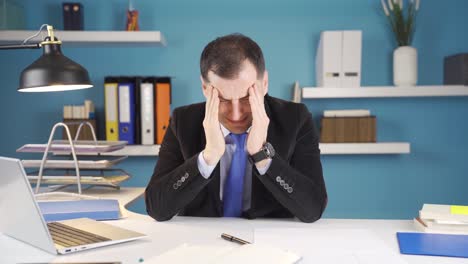 businessman getting bad and distressing news on laptop is upset and crying.