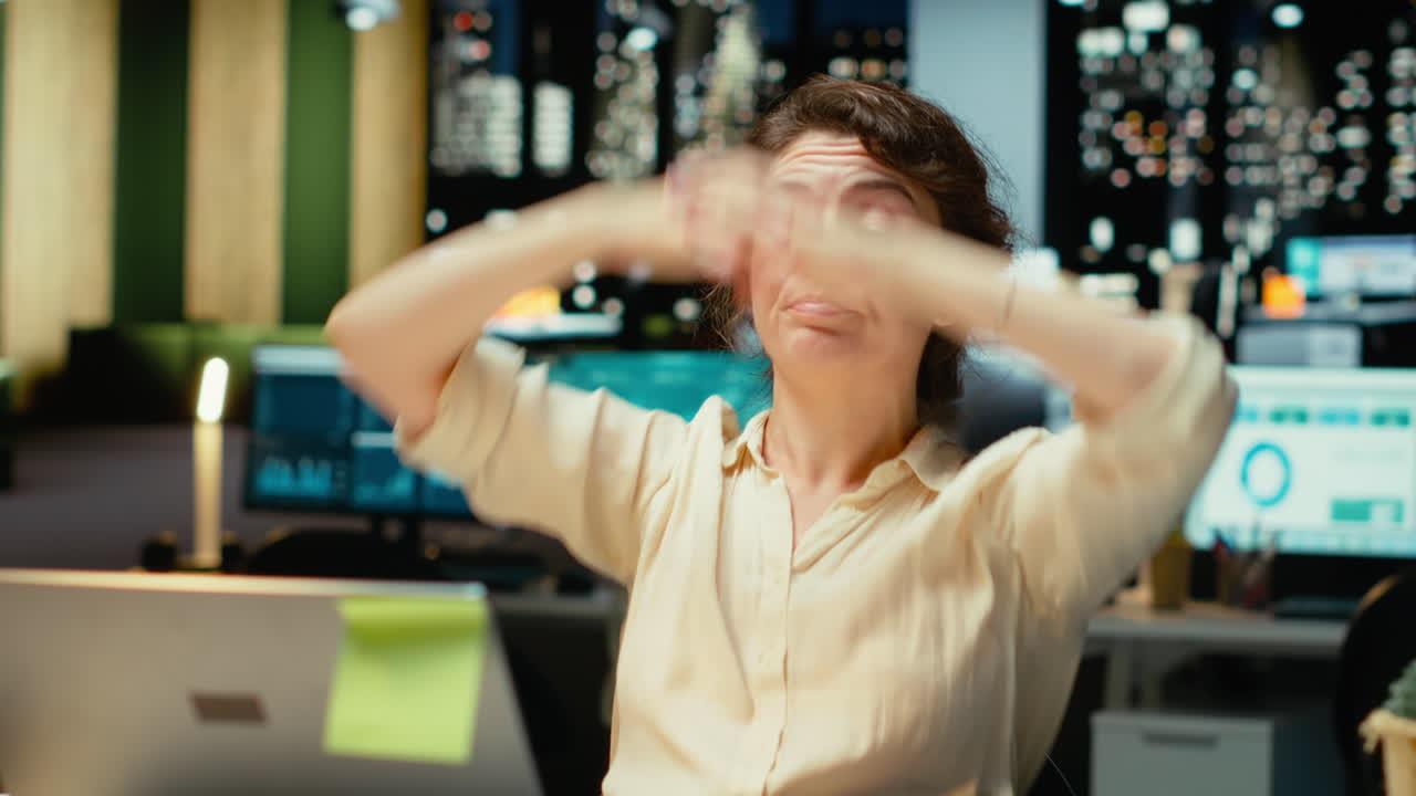 Vertical Video Businesswoman struggling to stay awake after an intense workload