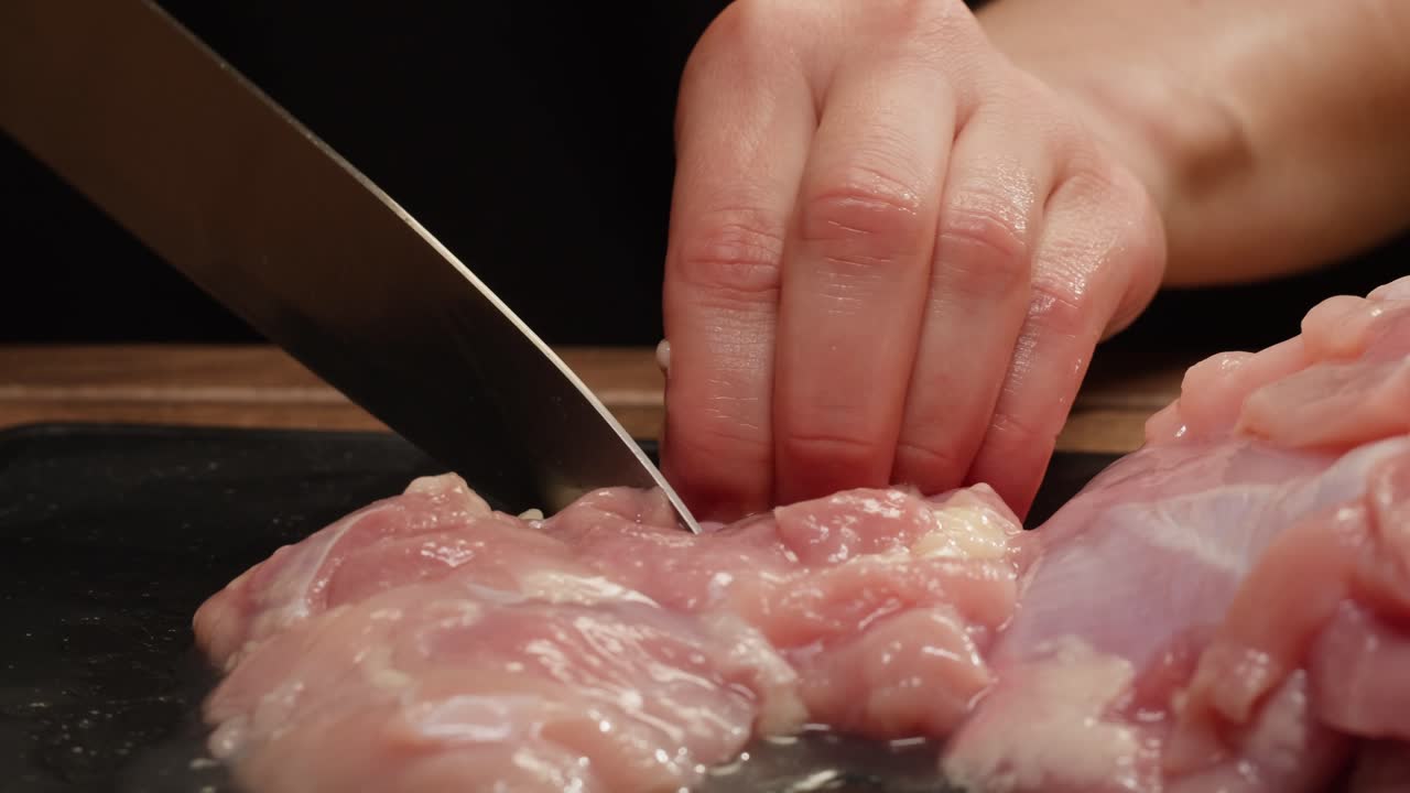 Cutting Raw Chicken