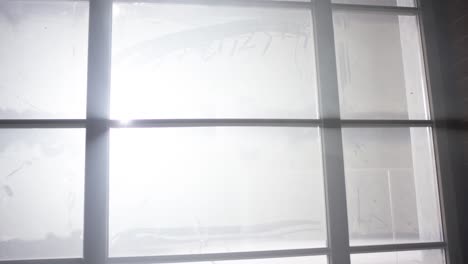 foggy window with sunlight