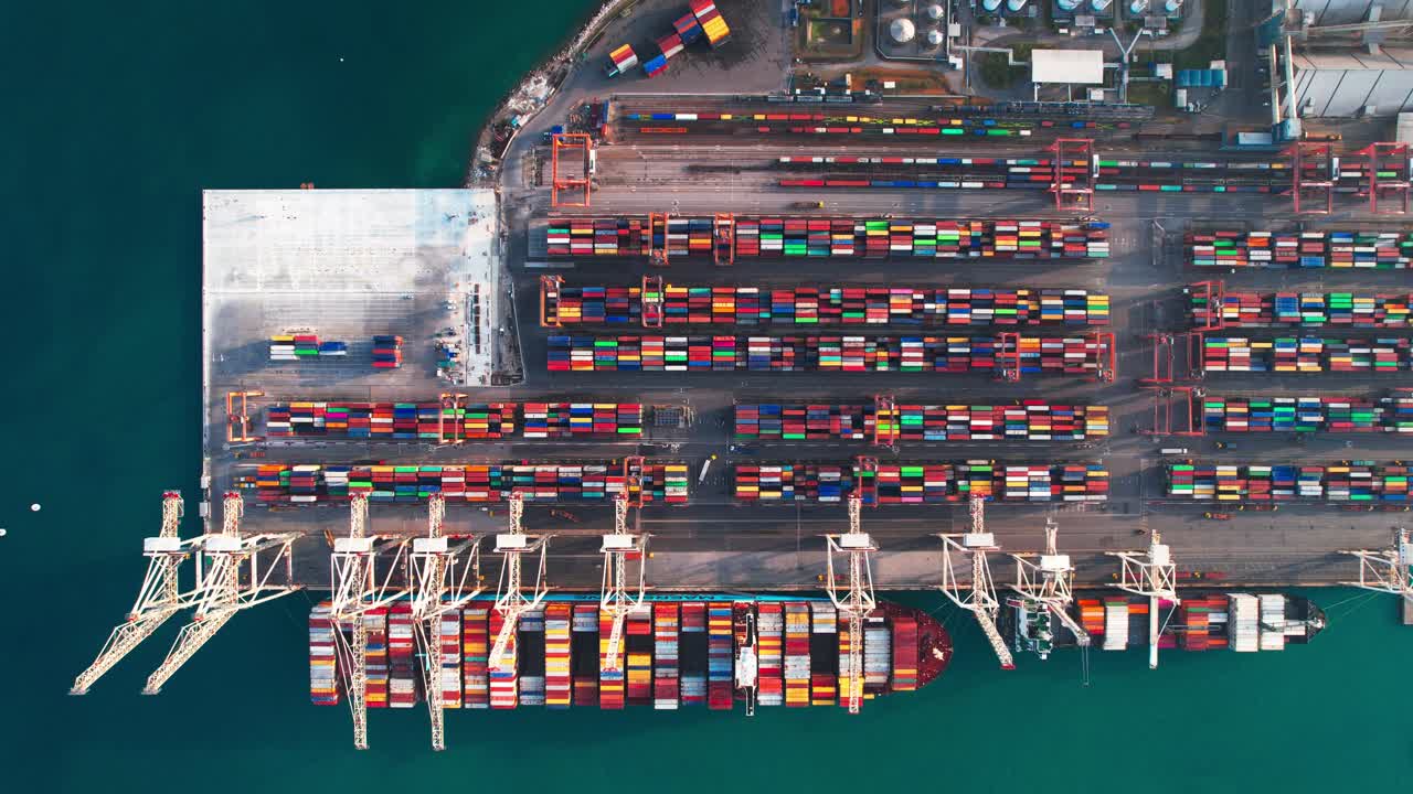 Aerial View Of The Shipping Port In Koper Capodistria Slovenia Loaded With Cranes And Colorful Cargo Containers