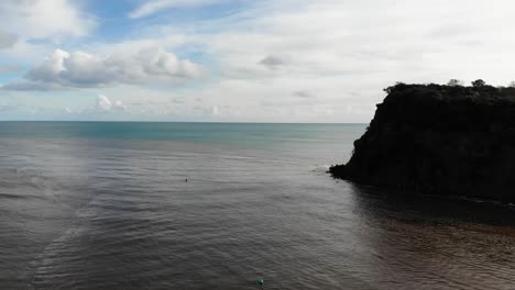 Aerial-rising-shot-of-the-tidal-waters-at-the-mouth-of-the-River-Teign-in-Devon-England