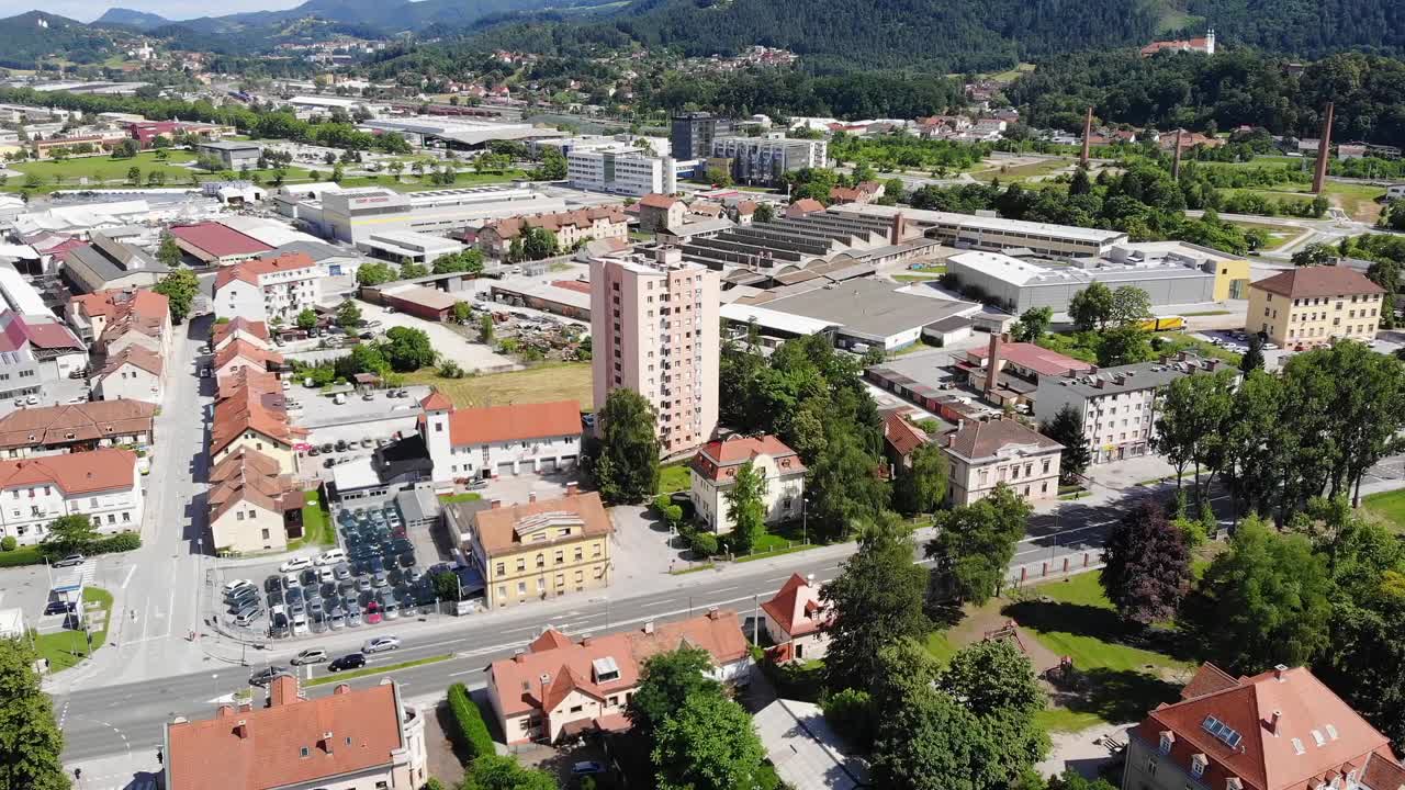 Aerial drone forward establishing shot of buildings, Golovec, Slovenia