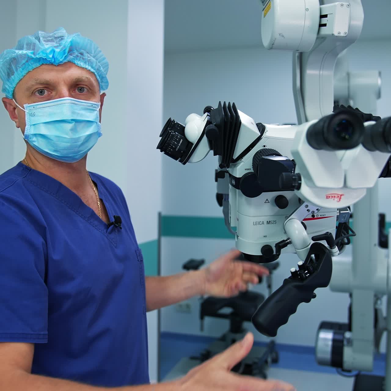 Medical specialist shows the usage of equipment in surgery room. Doctor moves microscope in different directions