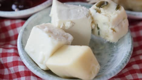 variety of cheeses on a plate