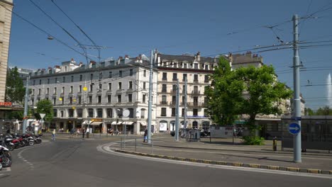 sunny day geneva city center famous traffic street square slow motion panorama 4k switzerland