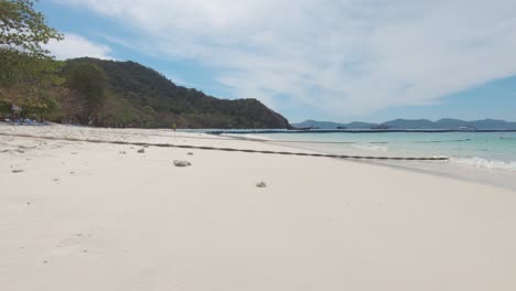 picturesque divine coastline of banana beach in koh hey , thailand - wide push in gimbal shot