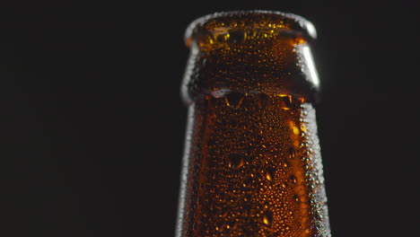 Close-Up-Of-Condensation-Droplets-On-Neck-Of-Bottle-Of-Cold-Beer-Or-Soft-Drink