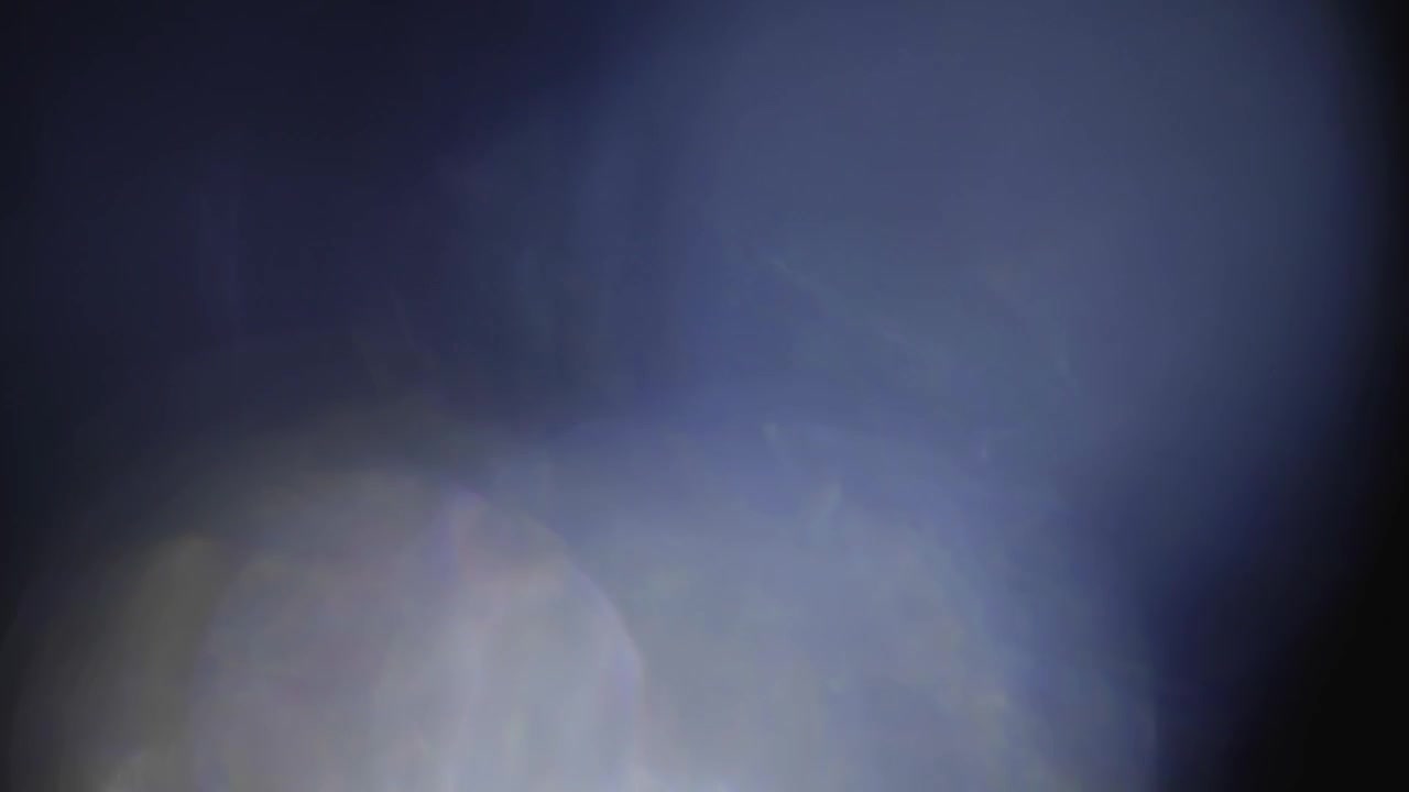 Ethereal Blue and Purple Light Leaks with Lens Flare