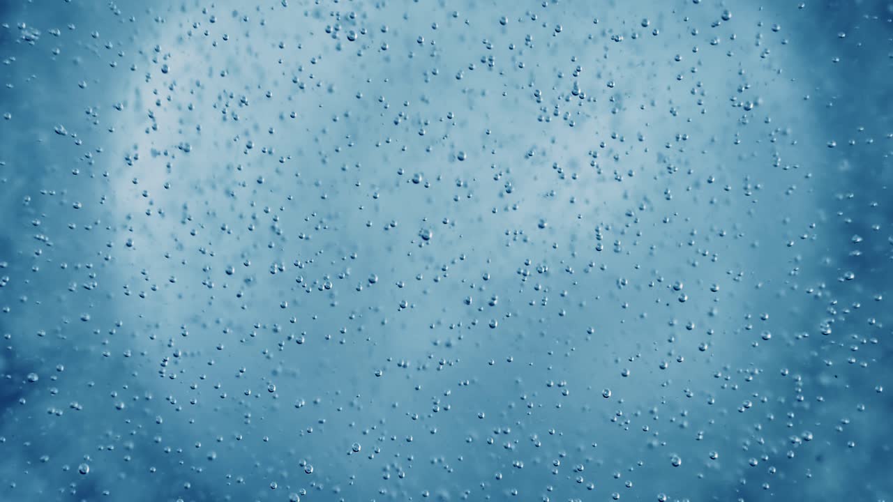 burbujas de oxígeno en el agua sobre un fondo abstracto azul