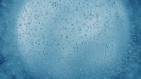 oxygen bubbles in water on a blue abstract background