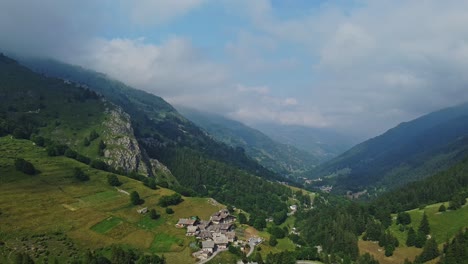 Stunning-view-of-the-Cottian-Alps-and-the-village-of-Busca-in-Italy-below