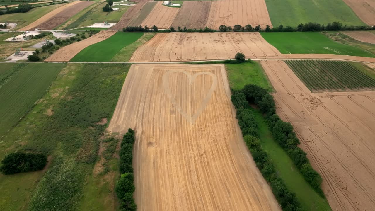 Heart In A Grain Field At Daytime - Aerial Drone Shot