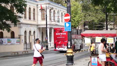 istanbul city street scene with double-decker bus and street food stalls