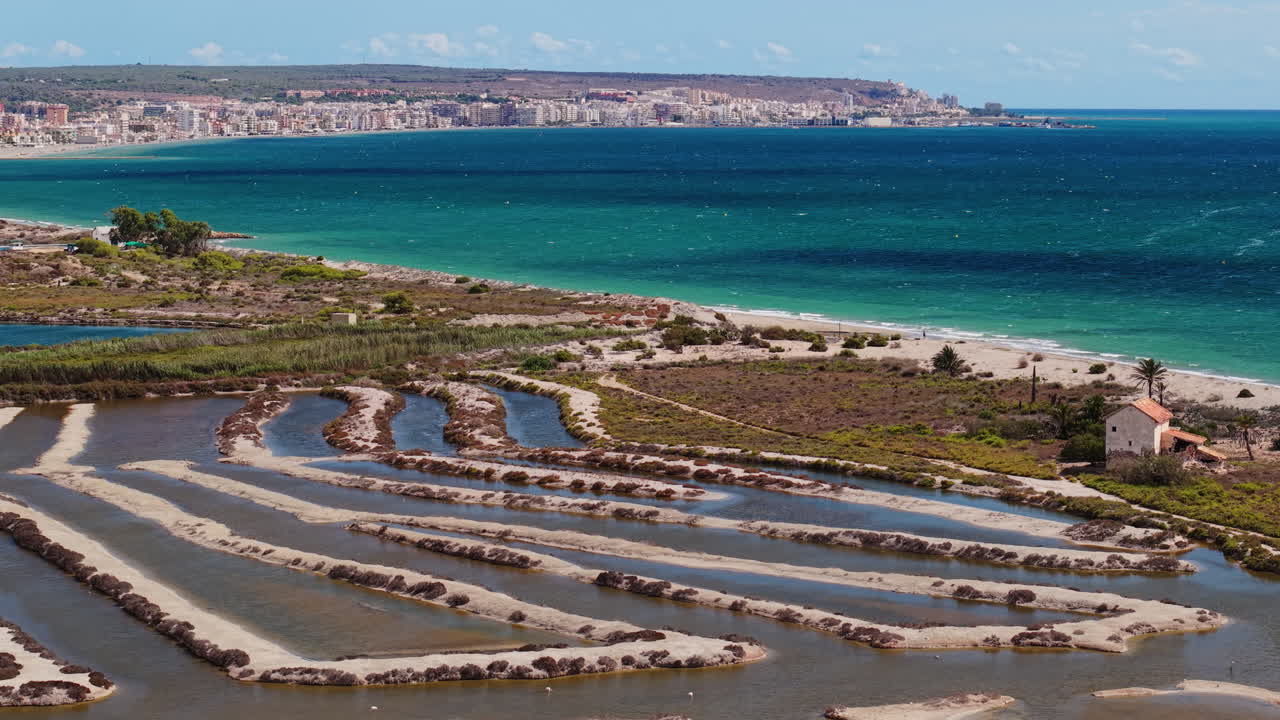 Coastal city with salt pans and a beautiful beach