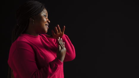 woman motioning timeout pause with arms