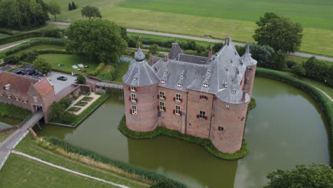 ammersoyen castle: aerial view traveling in the beautiful castle and seeing the bridge and the moat that surrounds it