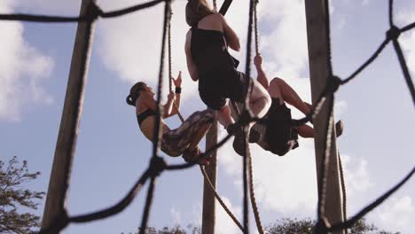 young adults training at an outdoor gym bootcamp