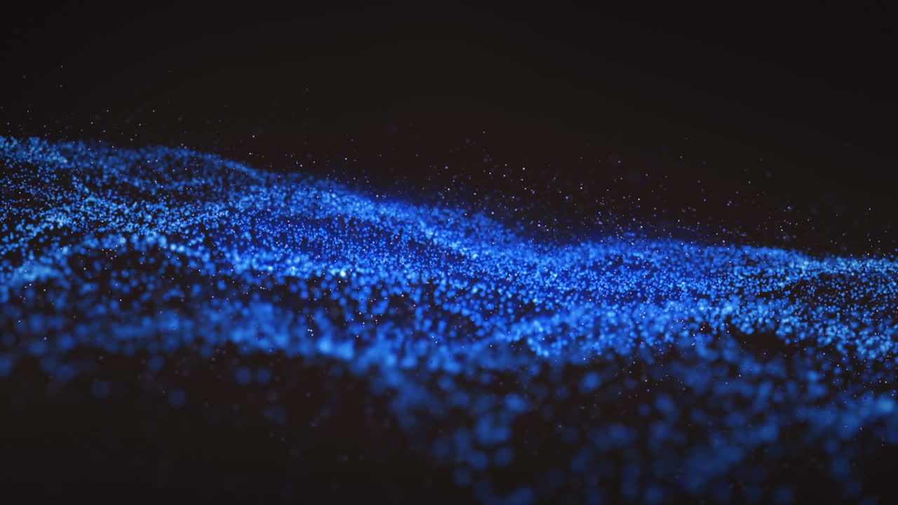 Animation of blue wave of spots on black background