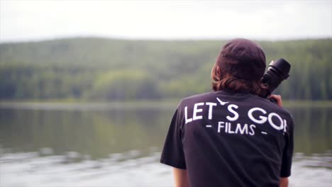 photographer on a lakeside