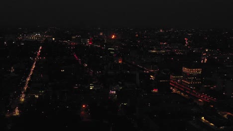 Fast-drone-aerial-flyover-of-Harlem,-NYC-at-twilight