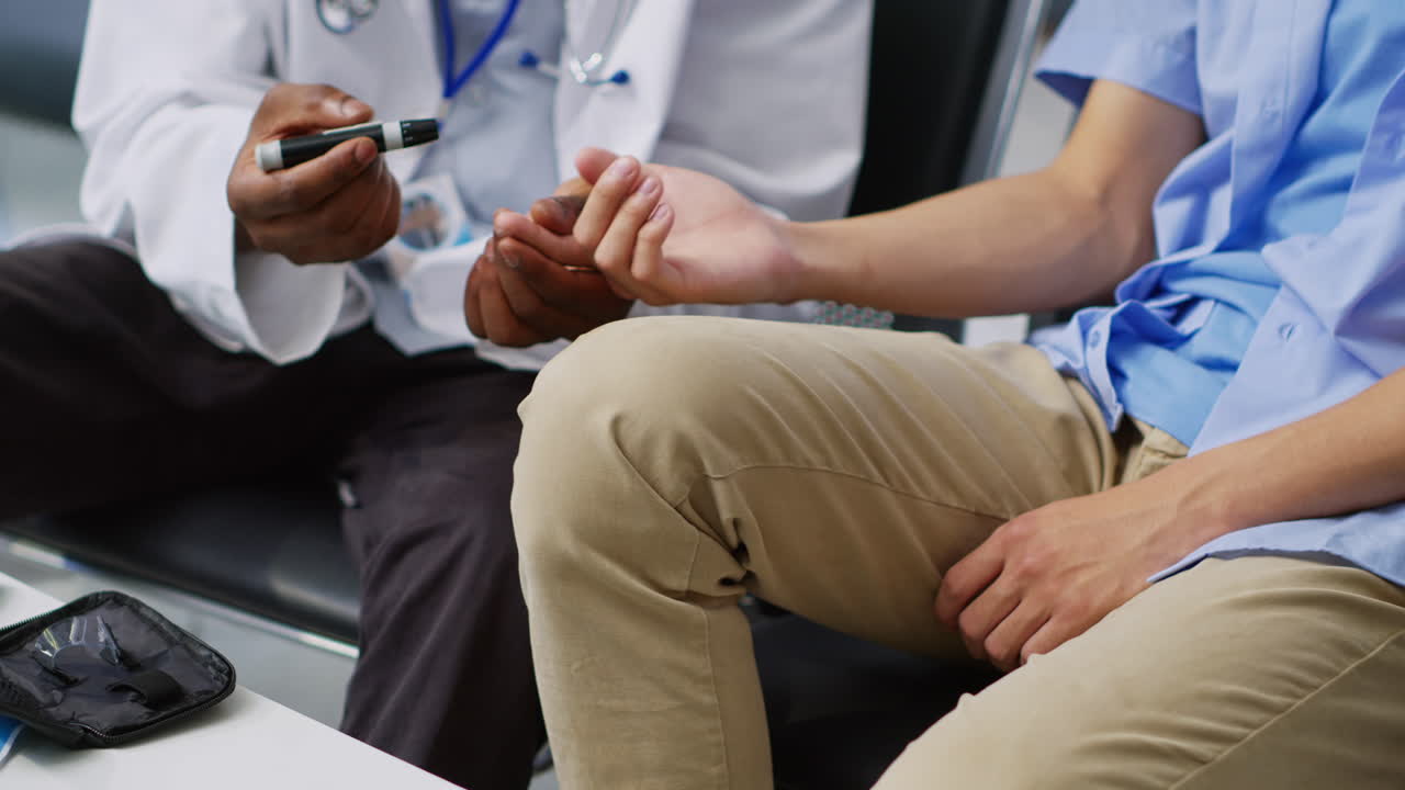 Doctor examining patient's pulse