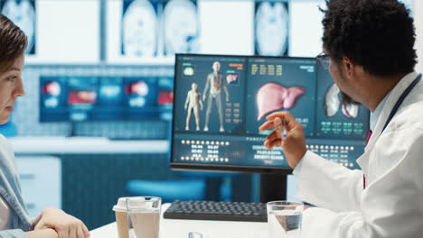 african american medic doing a scan interpretation with female patient