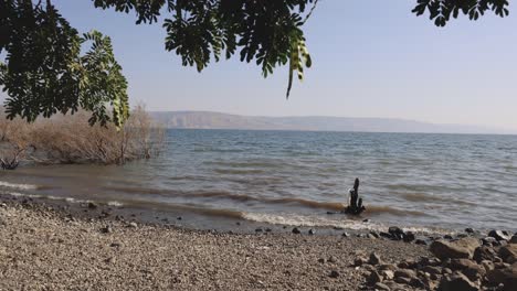 Relaxed-Rocky-Shore-By-The-Lake-Of-The-Galilee-In-Israel