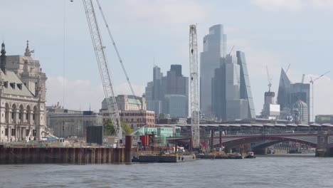 View-From-Boat-On-River-Thames-Showing-Buildings-On-City-Of-London-Financial-Skyline