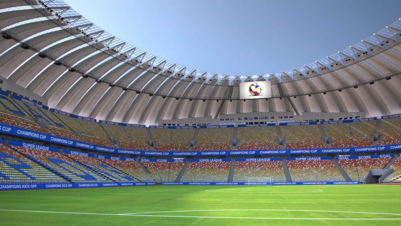 la cámara vuela hacia un estadio de fútbol vacío.