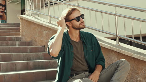 man sitting on stairs