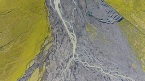 top down drone shot over a river delta, sunny, summer day in iceland