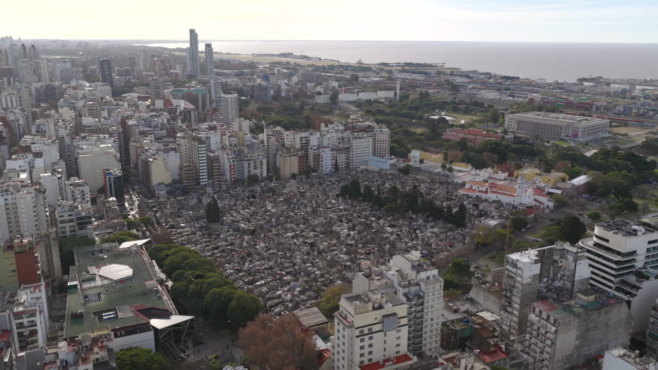Drone aerial view of Recoleta Cemetery and surrounding Buenos Aires cityscape, Argentina