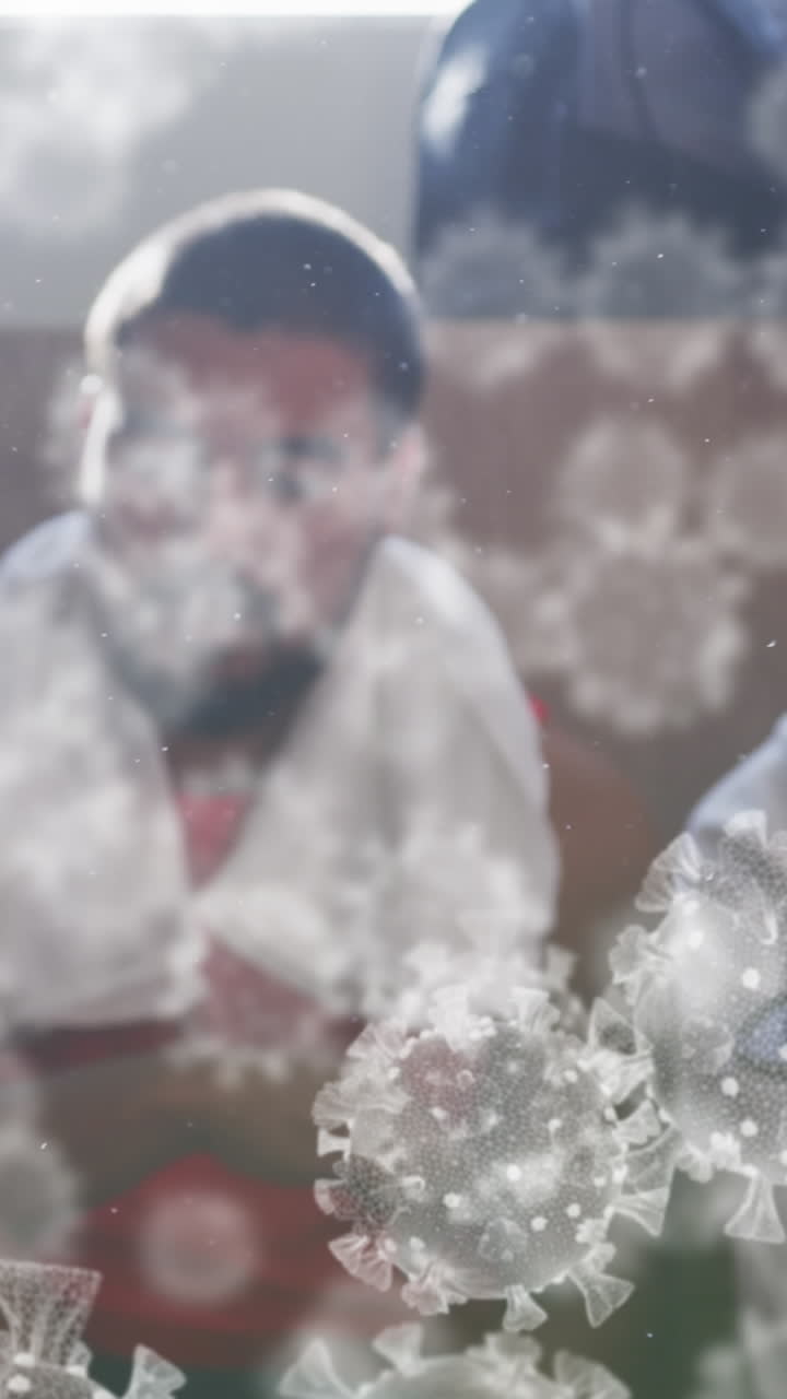 변기실에서 남성 축구 선수들의 다양한 그룹 위에 떠다니는 바이러스 세포의 애니메이션