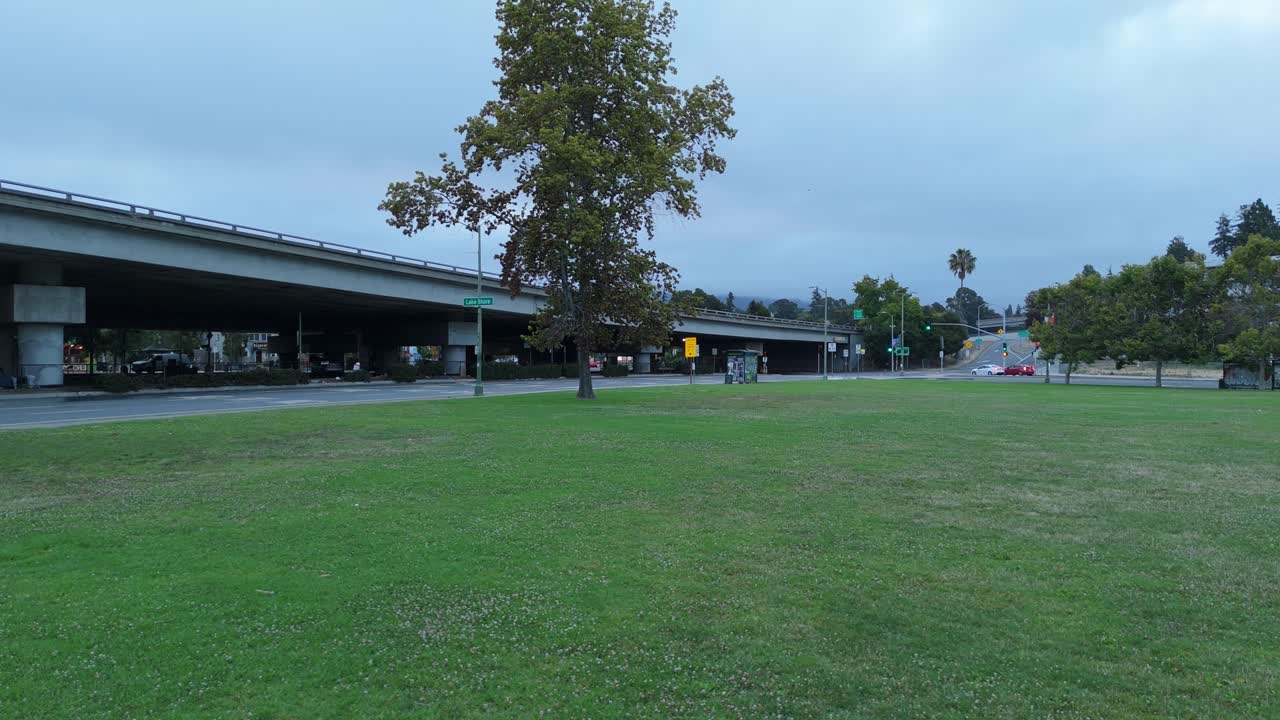 A descending drone view of Lake Merritt in Oakland California