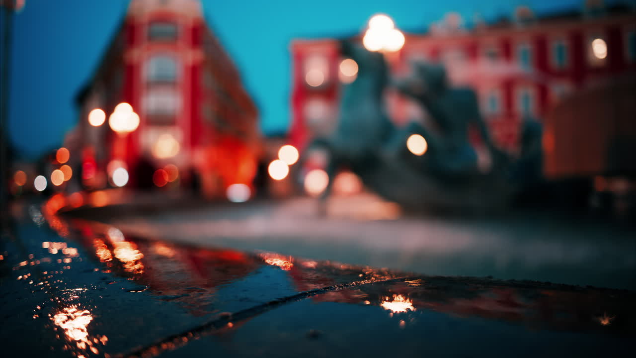 Nice, France - October 8, 2024: Close up of the Fontaine du Soleil at Place Massena in the evening