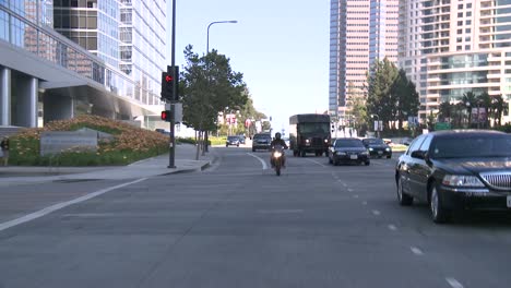 A-Car-Travels-Along-A-Street-In-Century-City-Los-Angeles-As-Seen-Through-The-Rear-Window-2