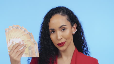 portrait of businesswoman with money fan