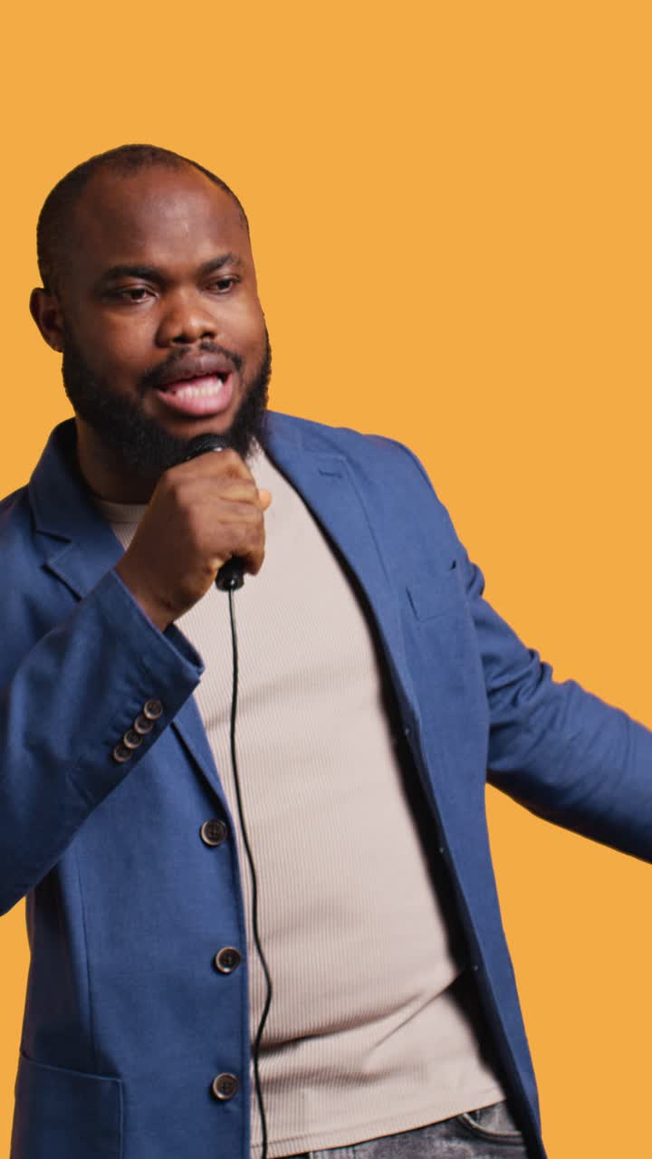 African American Man Singing Energetically into a Microphone