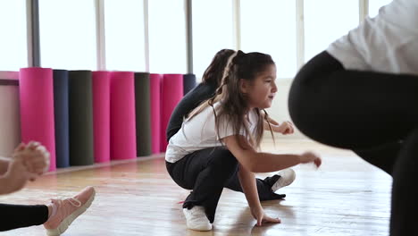 teacher and pupils in dance class