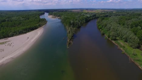 Aerial-view-of-two-different-rivers-merging-into-one