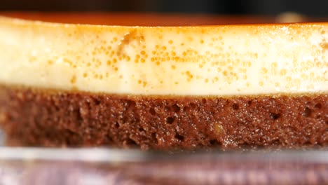 caramel custard pudding on a plate on table ,