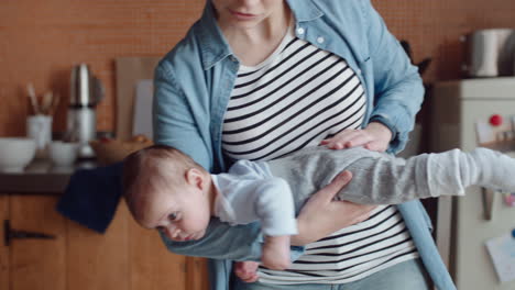 young-mother-dancing-with-baby-at-home-gently-calming-infant-enjoying-playful-dance-relaxing-in-moms-arms