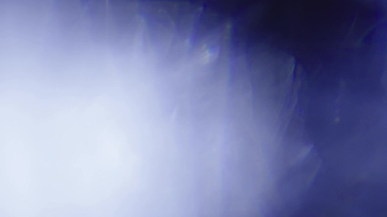 Abstract Blue Light Leak and Lens Flare Overlay Effect