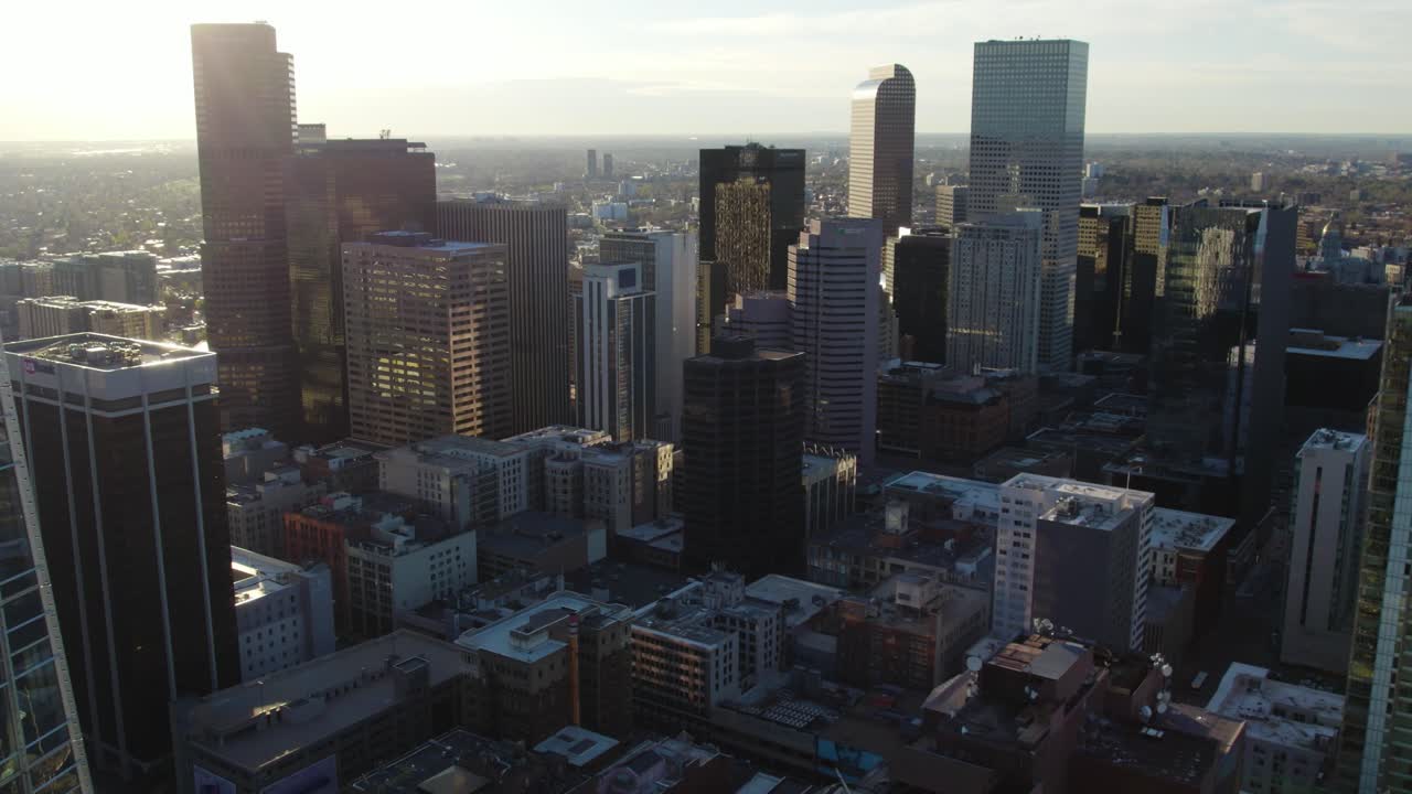Denver, Colorado USA. Ariel view of metropolitan area during sunrise revealing skyscrapers in downtown area.