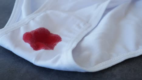 blood stain on white underwear