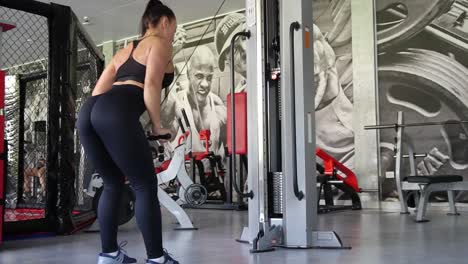 professional attractive young caucasian woman gym coach jumping on boxes performing cardio workout exercise practicing endurance. sportswoman
