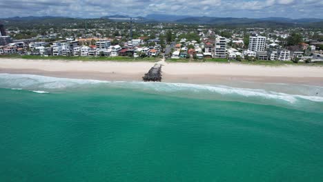 Aerial-View-Over-Seascape-And-Suburb-In-Palm-Beach,-Gold-Coast,-Queensland,-Australia---Drone-Shot