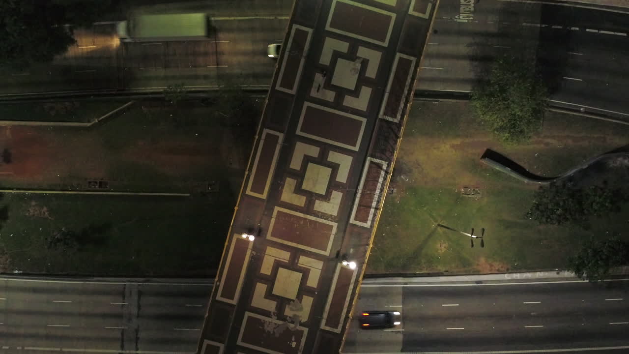 Aerial view of Santa Efigenia viaduct at night with no one in the street, at night, Sao Paulo downtown, Brazil