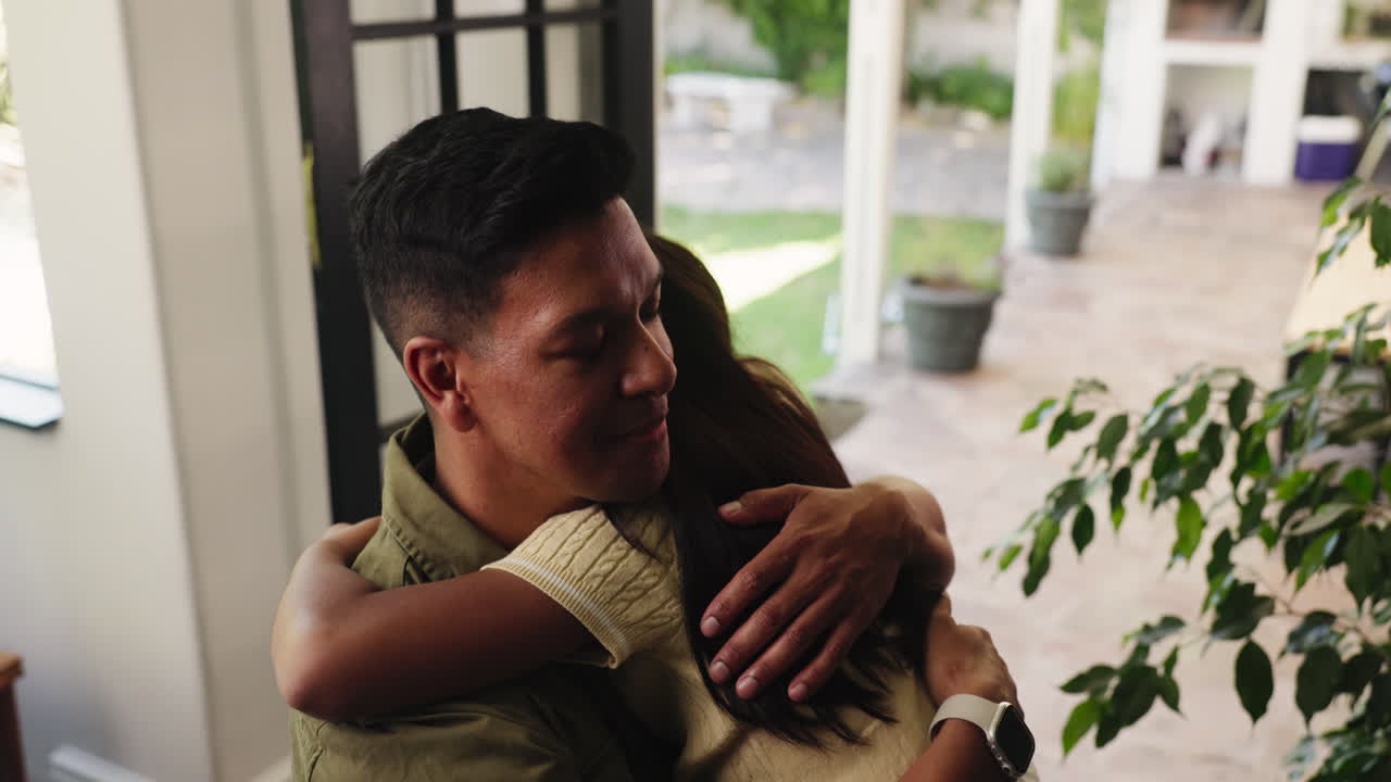 Man and Woman Embracing in a Warm Hug